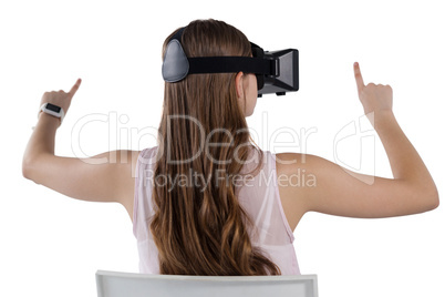 Teenage girl using virtual reality headset