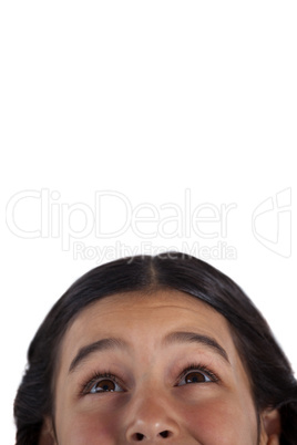 Girls eye and nose against white background