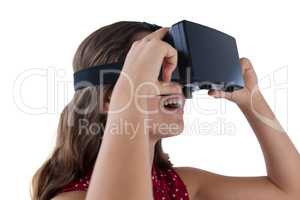 Teenage girl using virtual reality headset