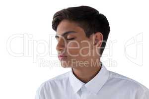 Teenage boy against white background