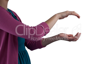 Teenage girl pretending to be hold invisible object