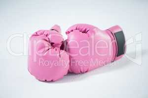 Close-up of pink boxing gloves