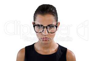 Portrait of serious young businesswoman wearing eyeglasses