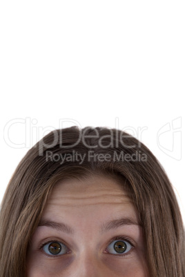 Girls eye and nose against white background