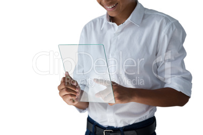 Teenage boy using a glass digital tablet