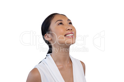 Close up of happy thoughtful businesswoman looking up