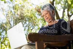 Senior woman using laptop