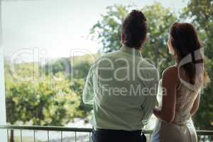 Couple looking at view in restaurant