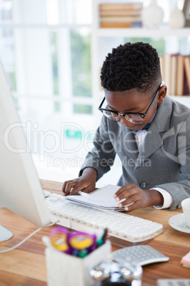 Businessman wearing eyeglasses making report