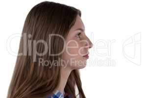 Teenage girl against white background