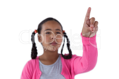 Girl pressing an invisible virtual screen