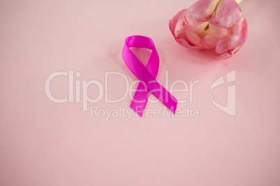 Close-up of Breast Cancer Awareness ribbon with tulip