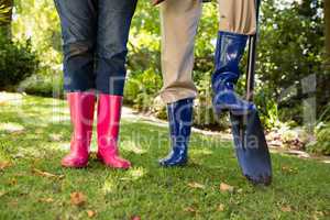 Senior couple standing in garden on a sunny day