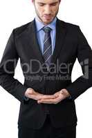 Businessman standing with hands cupped