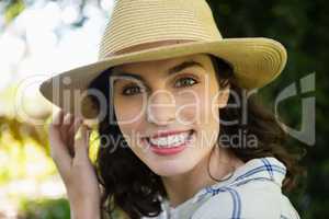 Portrait of smiling woman in garden