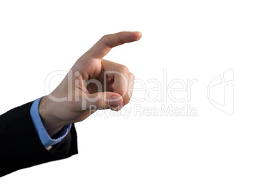 Cropped hand of businessman using invisible interface