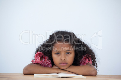 Close up portrait of businesswoman leaning on desk