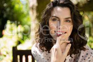 Portrait of smiling woman in garden