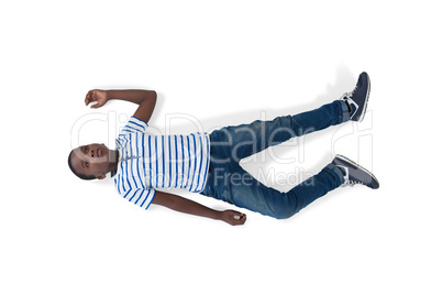 Boy lying on white background