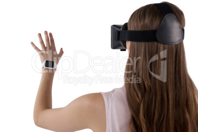 Teenage girl using virtual reality headset