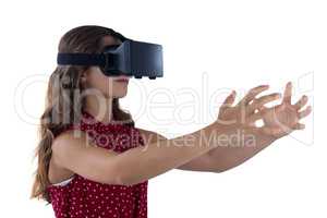 Teenage girl using virtual reality headset