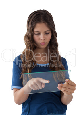 Girl using a glass digital tablet