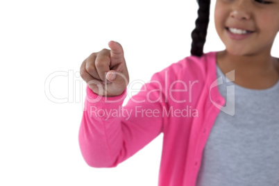 Girl pressing an invisible virtual screen