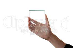 Cropped hand on businesswoman showing glass interface