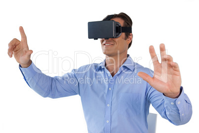 Happy businessman using vr glasses