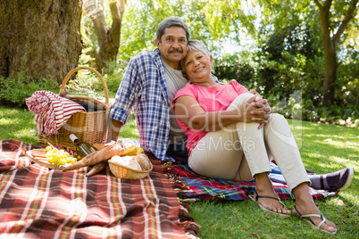 Senior couple sitting in garden