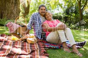 Senior couple sitting in garden