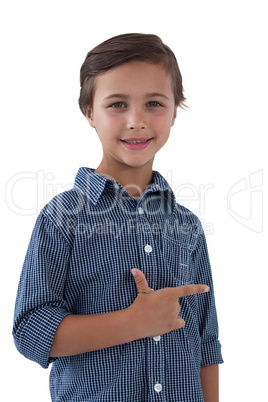 Happy boy posing against white background