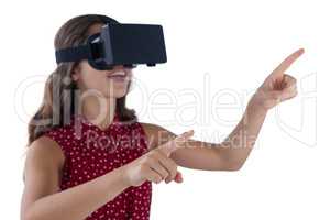 Teenage girl using virtual reality headset