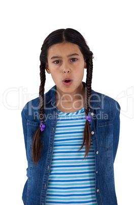 Cute girl surprised against white background