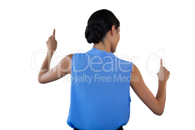 Businesswoman in sleeveless clothing pointing on interface