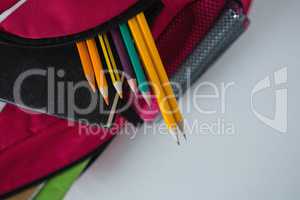 Various school supplies in schoolbag