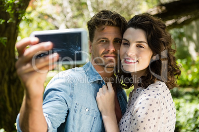 Couple taking selfie from mobile phone