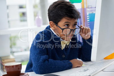 Businessman looking at computer monitor