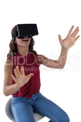 Teenage girl using virtual reality headset