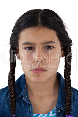 Sad girl looking down against white background