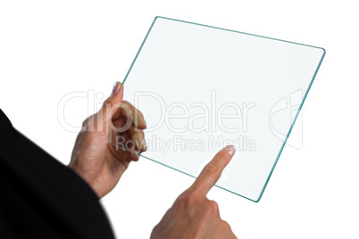 Cropped image of businesswoman touching glass interface