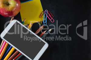Various stationery with apple and mobile phone