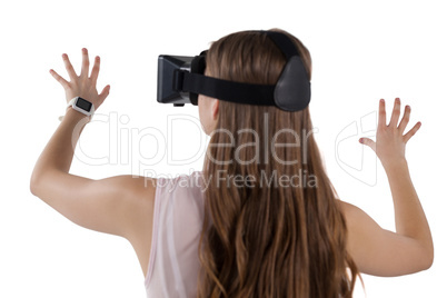 Teenage girl using virtual reality headset