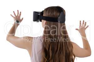 Teenage girl using virtual reality headset