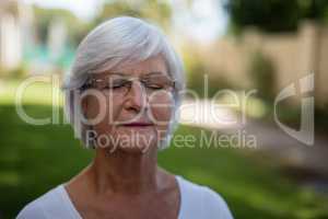 Senior woman with closed eyes