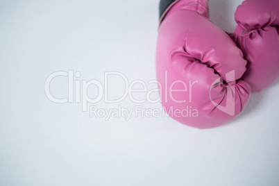 High angle view of pink boxing gloves