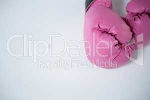 High angle view of pink boxing gloves
