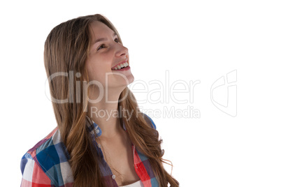 Thoughtful teenager smiling
