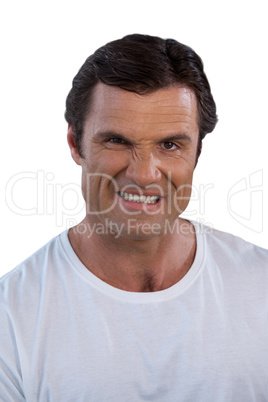 Portrait of mature man clenching teeth