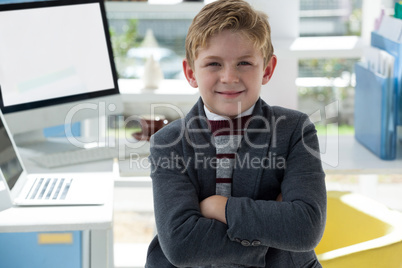 Portrait of confident businessman with arms crossed